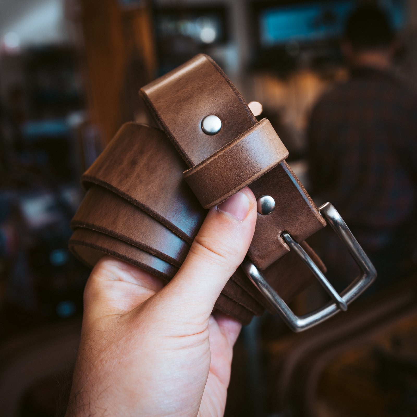 Leather Belt being held